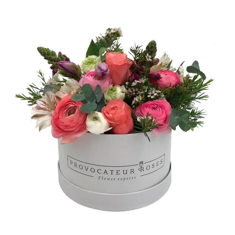 Box of mixed pink flowers