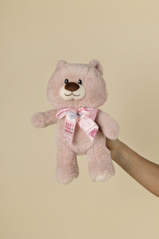 Peluche teddy rosa con lazo