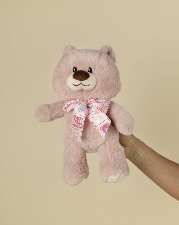 Peluche teddy rosa con lazo