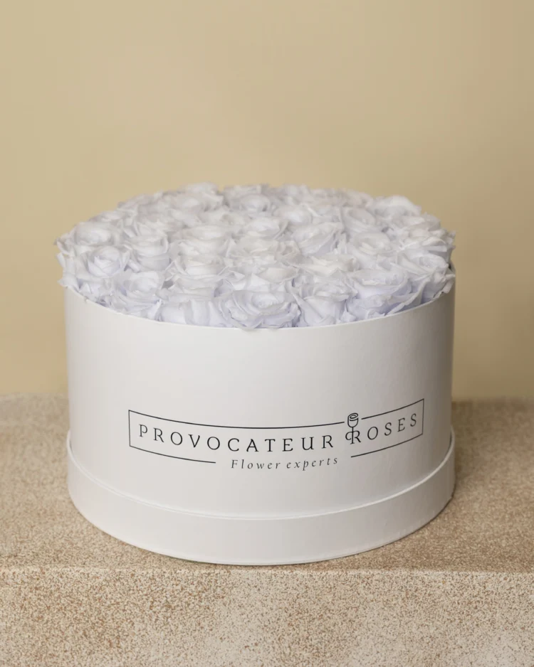 Round box of preserved lavender roses