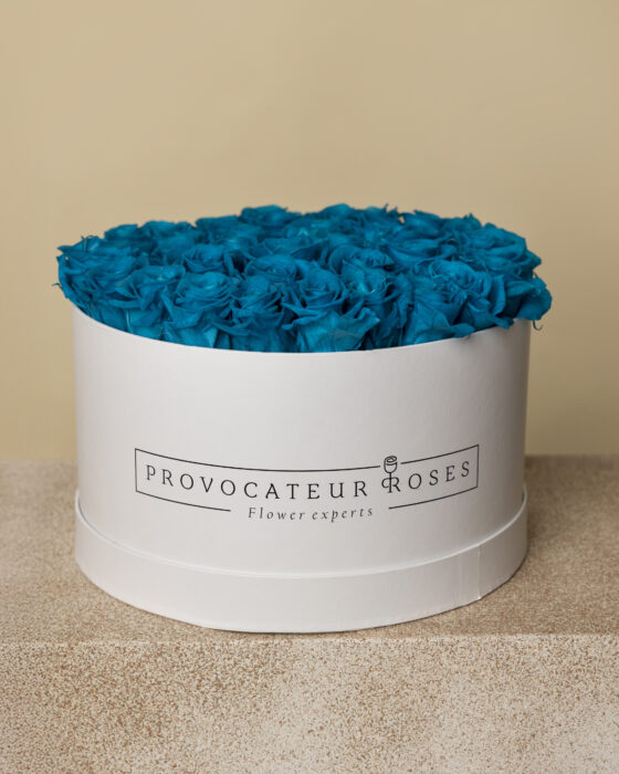 Caja redonda de rosas preservadas aquamarine