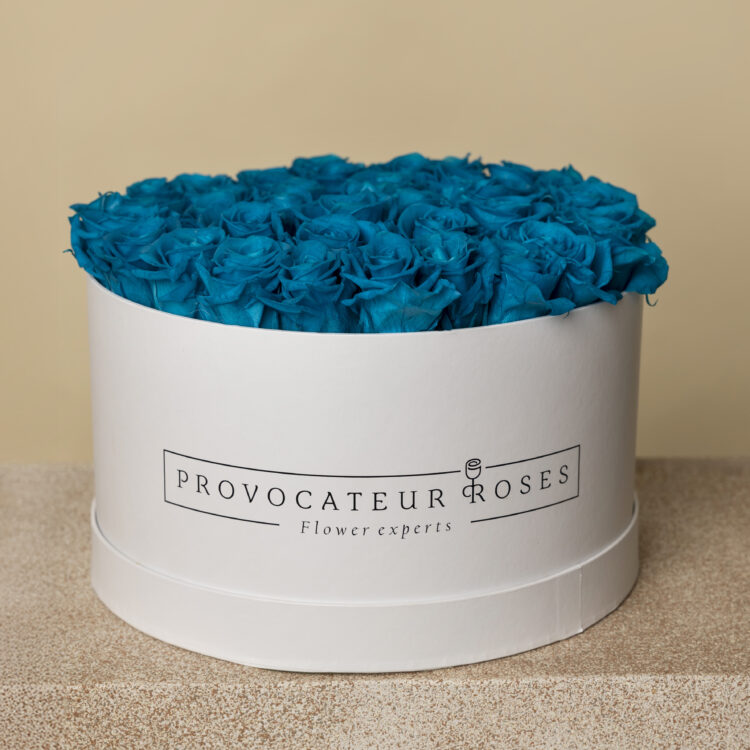 Caja redonda de rosas preservadas aquamarine