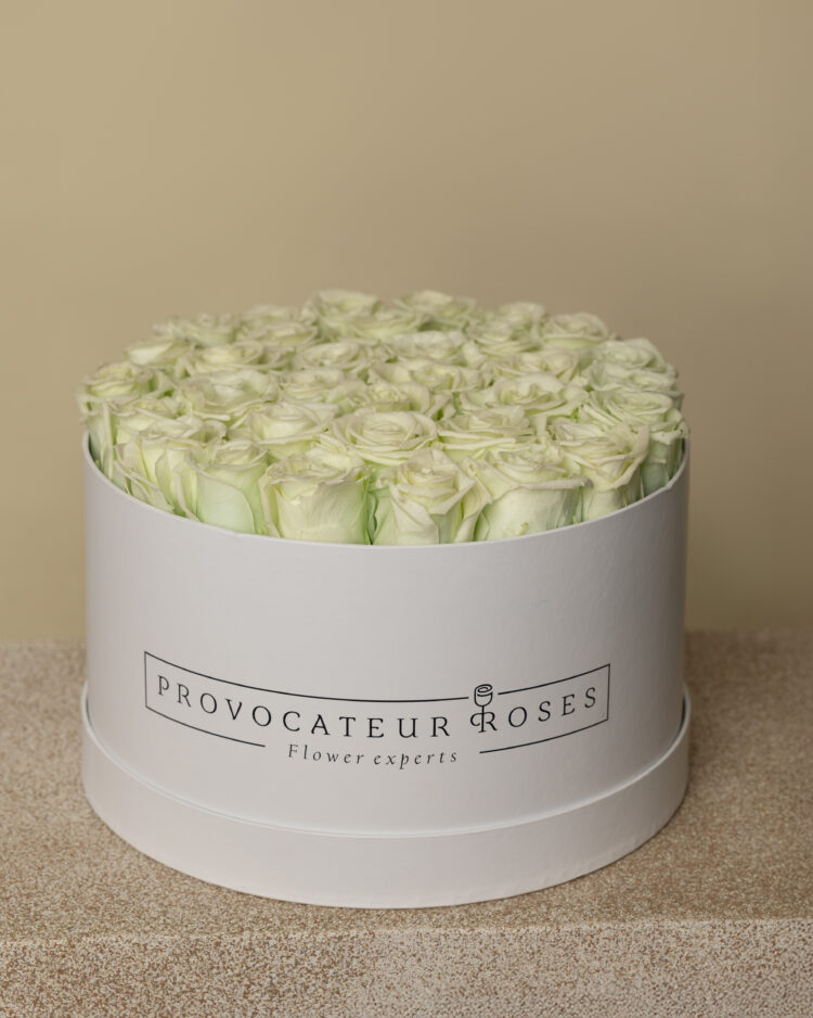 Caja redonda de rosas preservadas tiffany