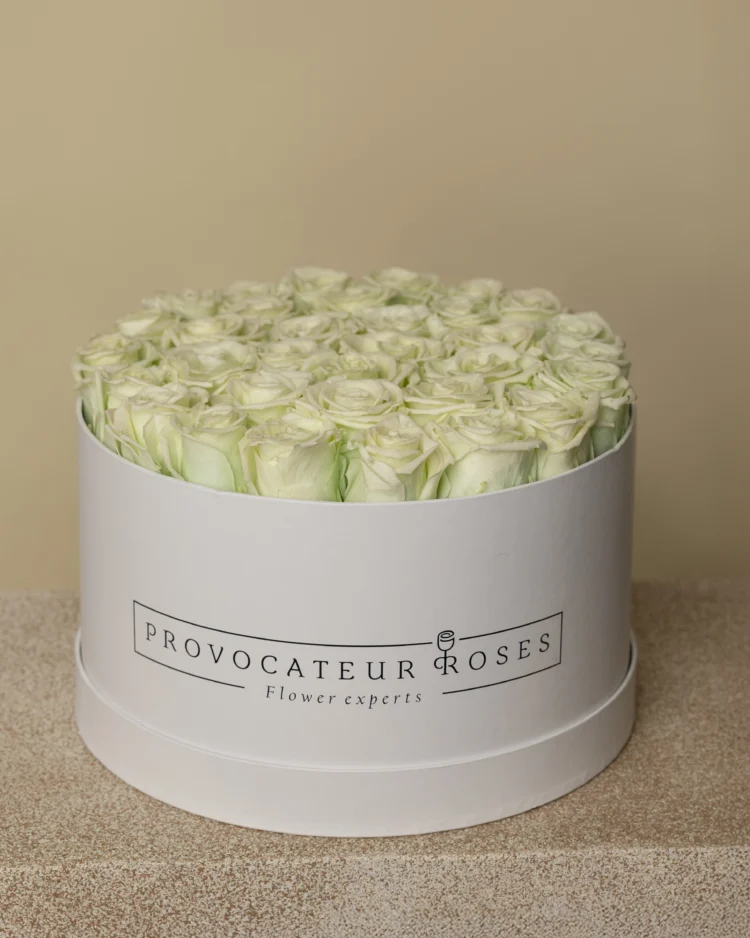Round box of preserved Tiffany roses